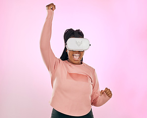 Image showing Vr glasses, futuristic software and black woman winner celebration of game win in studio. Pink background, isolated and happy young person with happiness from ai, future and cyber gamer experience