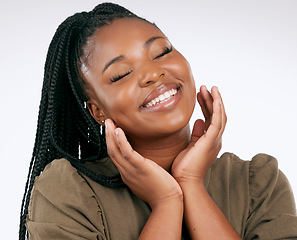 Image showing Happy, smile and black woman with skincare, beauty and facial wellness in a studio. White background, isolated and skin glow of young model with dermatology detox, cosmetics and face self care