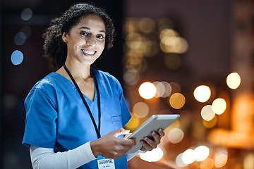 Image showing Tablet, city and portrait of a doctor working at night on the rooftop of the hospital building in city. Medical, lights and woman healthcare worker working late on mobile device on balcony of clinic.