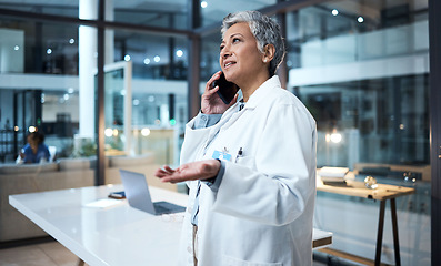 Image showing Night, woman and doctor with phone call, office and talking for planning, surgery schedule and consulting. Evening, happy mature female or medical professional with smartphone, healthcare or speaking