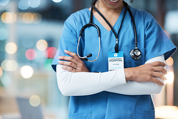 Image showing Doctor, arms crossed and stethoscope for healthcare cardiology, consulting or advice for wellness at hospital. Hands of confident medical professional, expert or specialist consultant at the clinic