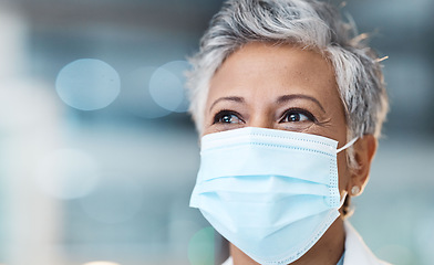 Image showing Elderly woman, face mask and health with Covid, safety from virus and doctor in PPE with healthcare mockup. Medicine, wellness and medical professional with bokeh overlay, surgery and protection