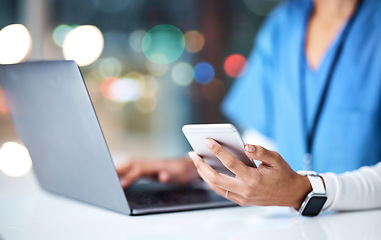 Image showing Laptop, healthcare and hands of nurse with phone for medical research, planning and schedule in hospital. Telehealth, communication and black woman with digital tech for online consultation in clinic