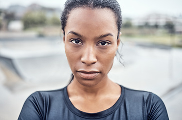 Image showing Fitness, woman and serious portrait for exercise, cardio workout or training in the city outdoors. African American female face looking in confidence or determination for sports, goals or exercising