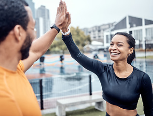 Image showing Couple of friends, high five and fitness in urban city for running success, team support and marathon winner. Happy athletes achievement for training celebration, sports motivation and exercise goals