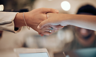 Image showing Handshake, partnership and woman in cafe for business deal, agreement and collaboration for startup. Success, teamwork and people shaking hands in coffee shop for thank you, welcome and support