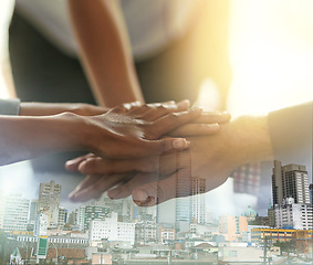 Image showing Office, stack of hands and business people in unity, collaboration and celebration for teamwork. City overlay, victory and corporate employees celebrating success or achievement together in workplace