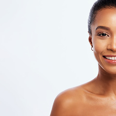 Image showing Black woman, half face and beauty portrait in studio, isolated white background and mockup space. Female model, split facial and skincare aesthetic for dermatology, smile and happy wellness cosmetics