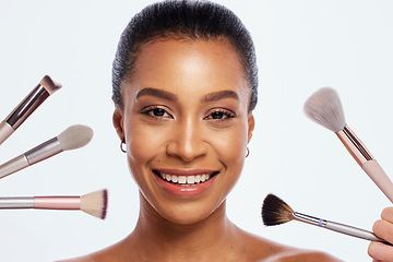 Image showing Beauty, makeup and brush for face of woman portrait in studio for dermatology and cosmetics. Happy aesthetic model person with facial tools for a healthy skin glow isolated on a white background