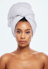 Image showing Black woman, portrait and head towel in studio, isolated white background and face beauty. Female model, clean shower and hair cloth for skincare, dermatology and bathroom cosmetics for body wellness