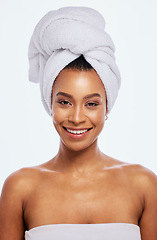 Image showing Hair towel, happy woman and portrait in studio, isolated white background and face beauty. Female model, clean shower and head cloth for skincare, dermatology and bathroom cosmetics for body wellness