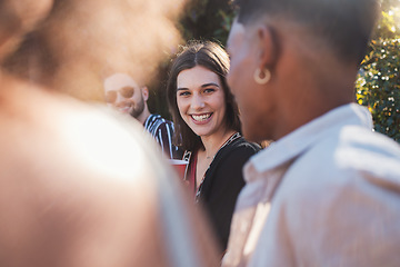 Image showing Smile, laughing and portrait of a woman at a party in summer with friends, drinks and holiday energy. Relax, happy and girl on a vacation with a group of people at a lodge enjoying the weekend