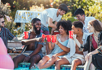 Image showing Friends, pool party and cheers on summer vacation with happy people drinking and laughing with feet in water. Friendship, diversity and fun smile in sun, men and women relax and celebrate together.