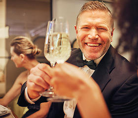 Image showing Champagne, cheers celebrate and party with man in suit, smile on face at formal luxury event. Success, bubbly wine and happy people celebration of achievement or birthday, toast with glass of bubbles