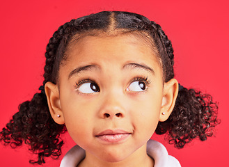 Image showing Child, face and worried eyes in thinking, curious and anxiety expression on isolated red background. Zoom, headshot and kid with wondering look on studio backdrop or little girl with ideas and vision