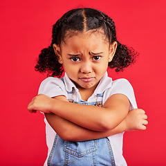 Image showing Child, arms crossed or sad portrait on isolated red background for depression, mental health or crying face. Upset, unhappy or little girl with sulking, grumpy or facial expression in bullying crisis