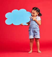 Image showing Kid, pointing or speech bubble in ideas, opinion or vote on isolated red background in social media, vision or news. Smile, happy or child showing banner, paper or cardboard poster in speaker mockup