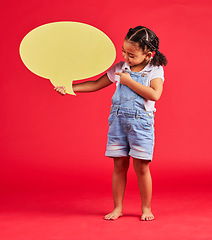 Image showing Child, pointing or speech bubble in ideas, opinion or vote on isolated red background in social media, vision or news. Smile, happy or kid showing banner, paper or cardboard poster in speaker mockup