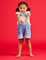 Image showing Excited kid, portrait or piggy bank success in money planning, savings or future investment on isolated red background. Smile, happy child or cash box in finance growth, budget learning or investment