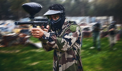 Image showing Man, paintball or gun aim in motion blur games arena or challenge in teamwork competition, sports or military training. Player, rifle or shooting equipment for soldiers, fast army or battlefield war