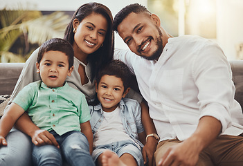 Image showing Father, mother and kids with smile for family portrait, holiday break or weekend relaxing on living room sofa at home. Happy dad, mom and children smiling in joy for fun bonding relationship indoors