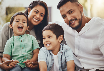 Image showing Father, mother and children with smile for family time, holiday break or weekend relaxing on living room sofa at home. Happy dad, mom and kids smiling in joy for fun bonding or relationship indoors