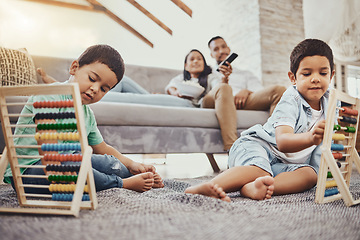 Image showing Math, family or children learning for development growth with mother and father relaxing watching tv. Education, siblings or young boys playing fun toys or counting games for kids at home together