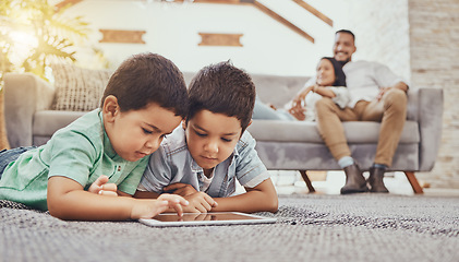 Image showing Children with tablet, games or streaming with parents at family home, gaming with technology or video watching. Internet, wifi and childhood, mother and father relax with boys and screen time