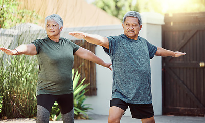 Image showing Exercise, yoga and health with a senior couple outdoor in their garden for a workout during retirement. Fitness, pilates and lifestyle with a mature man and woman training together in their backyard