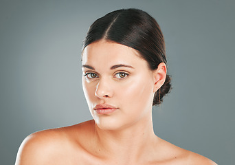 Image showing Facial beauty, portrait and woman in studio for skincare, wellness and cosmetics. Young female model, face headshot and aesthetic dermatology, healthy shine and natural glow from body salon results