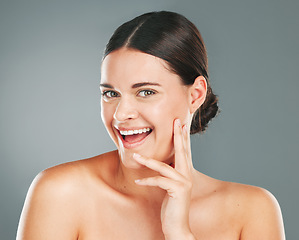 Image showing Beauty, skincare glow and portrait of a woman face with wellness, facial and smile. Isolated, studio background and cosmetic dermatology treatment of a young person with happiness from cosmetics