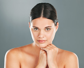 Image showing Woman, skincare and portrait in studio for wellness, beauty and facial cosmetics. Young female model, face and aesthetic makeup for dermatology, healthy shine and natural glow from body salon results