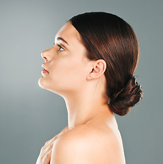 Image showing Woman, beauty and facial profile in studio for skincare, wellness and cosmetics. Young female model, face side and dermatology for aesthetic makeup, healthy shine and natural glow from salon results