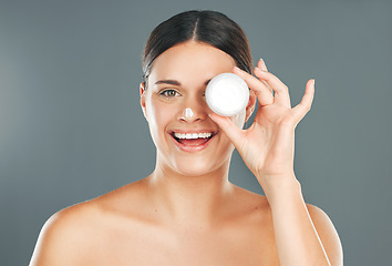 Image showing Woman apply cream for face with happiness and beauty portrait, skincare and moisturizer isolated on studio background. Sunscreen, lotion and healthy skin glow, wellness and facial treatment product