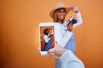 Image showing Friends taking picture on a phone of woman isolated on wall background on social media or digital memory. Hand holding smartphone screen for happy profile of gen z, influencer person in summer mockup