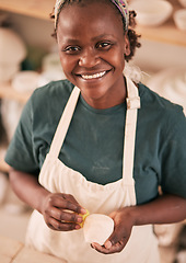 Image showing Art, pottery and black woman in creative workshop with ceramics, sculpting and creativity with smile in portrait. Artist with handmade craft, pride and success with manufacturing and artistic process