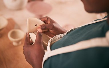 Image showing Art, pottery zoom and black woman hands in creative workshop with ceramics, sculpting and creativity. Artist with handmade craft, manufacturing and artistic process with design skills and texture