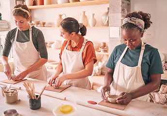 Image showing Pottery sculpting and people row at workshop together for creative process, production and productivity. Focus, concentration and talent of interracial team of women in artistic workspace.