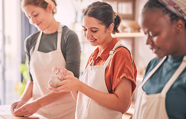 Image showing Pottery class, women workshop or happy people design sculpture mold, clay manufacturing or art product. Diversity, ceramic retail store or startup small business owner, artist or studio group molding