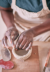 Image showing Pottery bowl, hands and woman design sculpture mold, creative manufacturing or art product. Ceramic store, startup small business owner or African artist working on clay handcraft in studio workshop