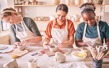 Image showing Pottery class, creative workshop or women design sculpture mold, clay manufacturing or art product. Diversity, ceramic retail store or startup small business owner, artist or studio group molding