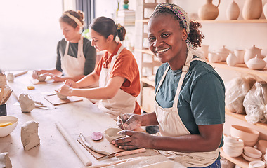 Image showing Pottery class, group workshop or portrait woman design ceramic mold, clay manufacturing or art product. Diversity studio, retail sales store or startup small business owner or African artist molding