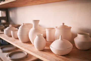 Image showing Pottery background, ceramics and shelf in workshop, creative store or manufacturing startup. Clay products, collection and display in studio, small business and retail craft shop of stock production