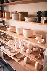 Image showing Pottery background, ceramics store and shelf in creative studio of manufacturing startup. Clay design, collection and display in workshop, small business and retail craft market of stock production