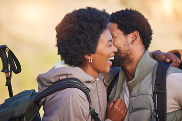 Image showing Happy couple, love and black people hiking in sunrise kissing and hugging outdoors after workout, fitness and exercise. Romantic and healthy lovers affectionate after training together in nature