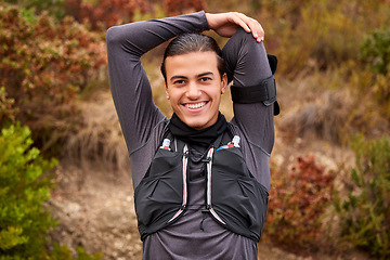 Image showing Stretching, fitness and portrait of man in nature training, exercise or workout sports, runner or hiking. Happy, trekking and muscle warm up with smile of professional athlete for wellness in forest