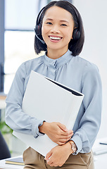 Image showing Portrait, portfolio or happy manager in a call center with a smile or file documents in customer services. Woman, contact us or Japanese telemarketing sales agent in leadership at technical support