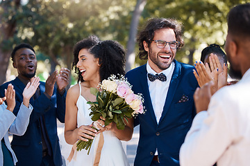 Image showing Wedding crowd and applause to celebrate couple with happy, excited and cheerful smile. Interracial love and happiness of bride and groom at marriage event together with guests clapping.