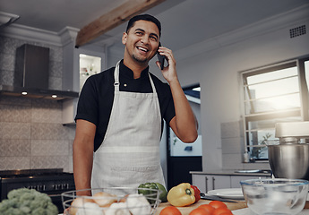 Image showing Man, happy phone call and cooking in kitchen for healthy nutrition, food diet and organic vegetables salad. Young male, chef happiness lifestyle and smile for smartphone call or cook dinner in home