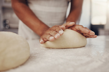 Image showing Man hands and dough press in kitchen for baking preparation work and process at culinary counter. Restaurant chef and worker in professional kitchen preparing wheat bread, cake or pizza recipe.